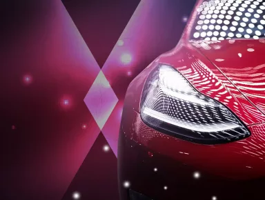 Punainen Tesla Model 3, jonka voit voittaa BitStarz Casinon arvonnassa