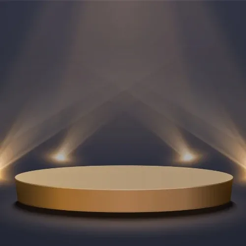 En rund guld cirkel och fyra spotlights på en mörkgrå bakgrund
