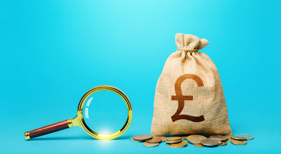 investigating money bag on blue background
