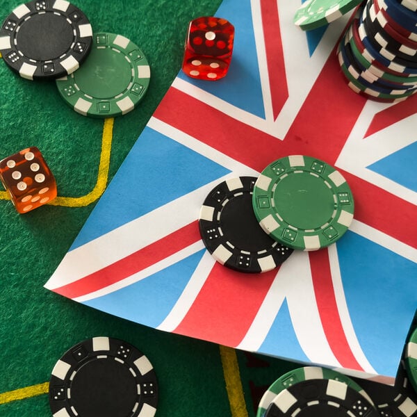 Poker chips, flag of Great Britain on blackjack table
